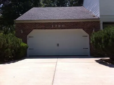 New white garage door system in house