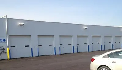 New multiple garage door system in warehouse