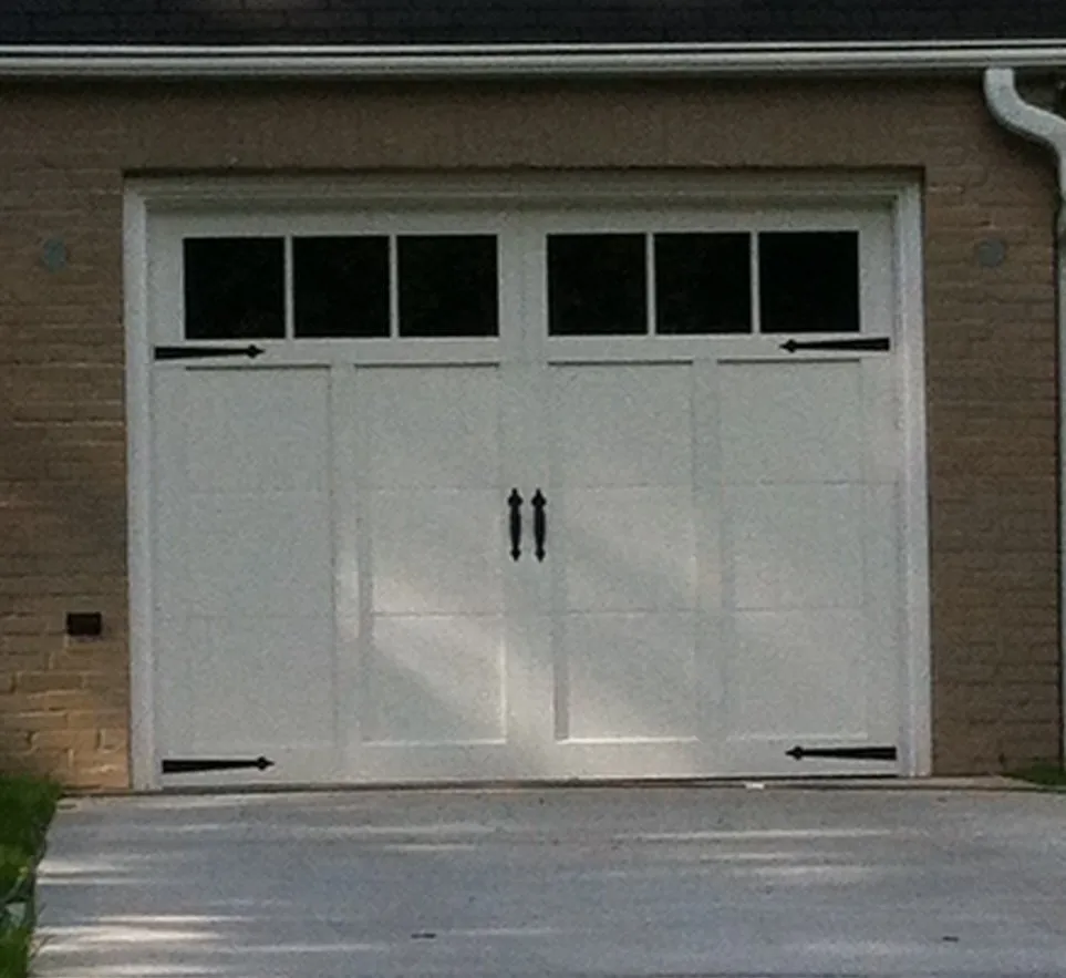 New white garage door system in house