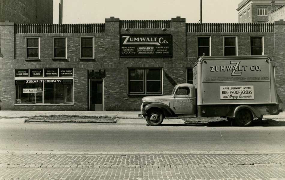 historical photo showing exterior of Zumwalt corporation and truck outside
